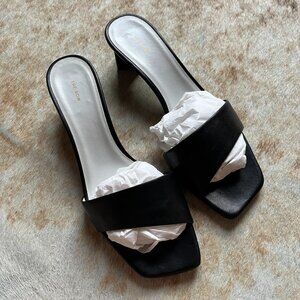 The Row black leather slides size 39.5